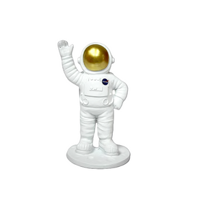 Astronaut figurine with a gold helmet on a transparent background